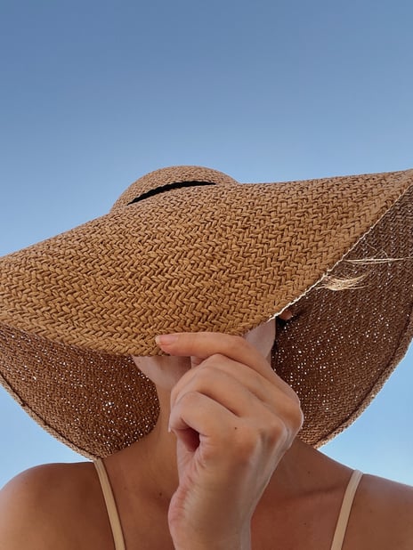 Woman Wearing a Straw Hat